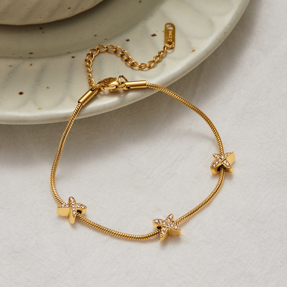 Cross station bracelet