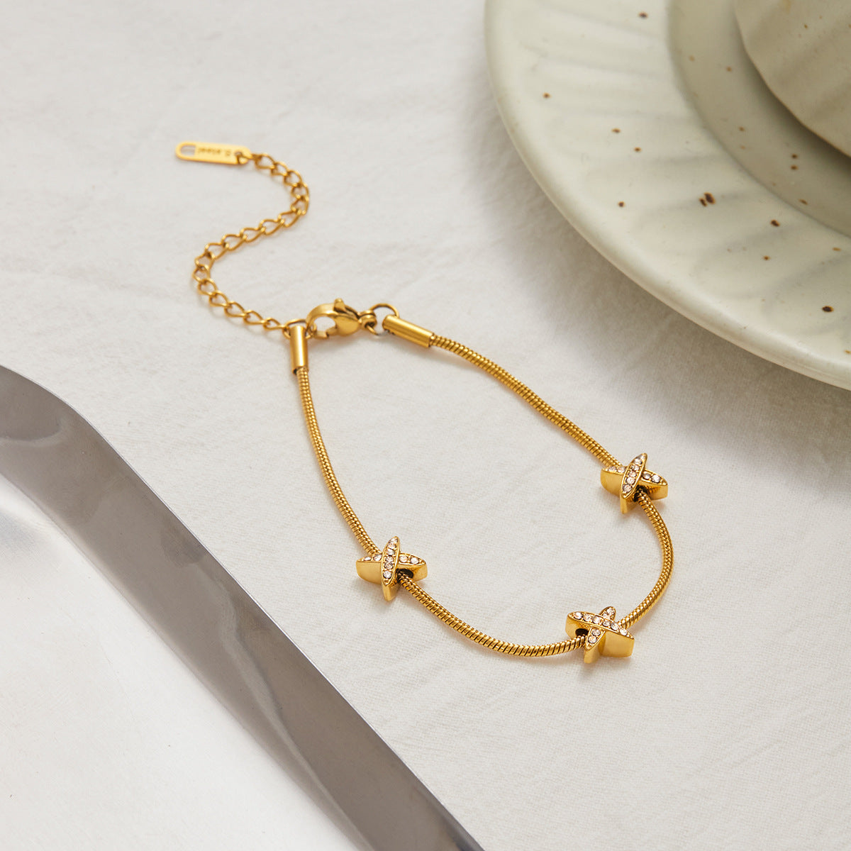Cross station bracelet